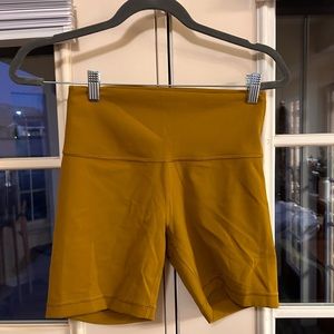 Lululemon Wunder Train High Rise Short- 8 inch. Gold Spice. Size 8. EUC.